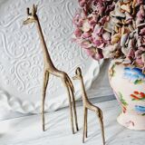 Stylized brass giraffes