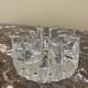 Designer candle holder in thick glass