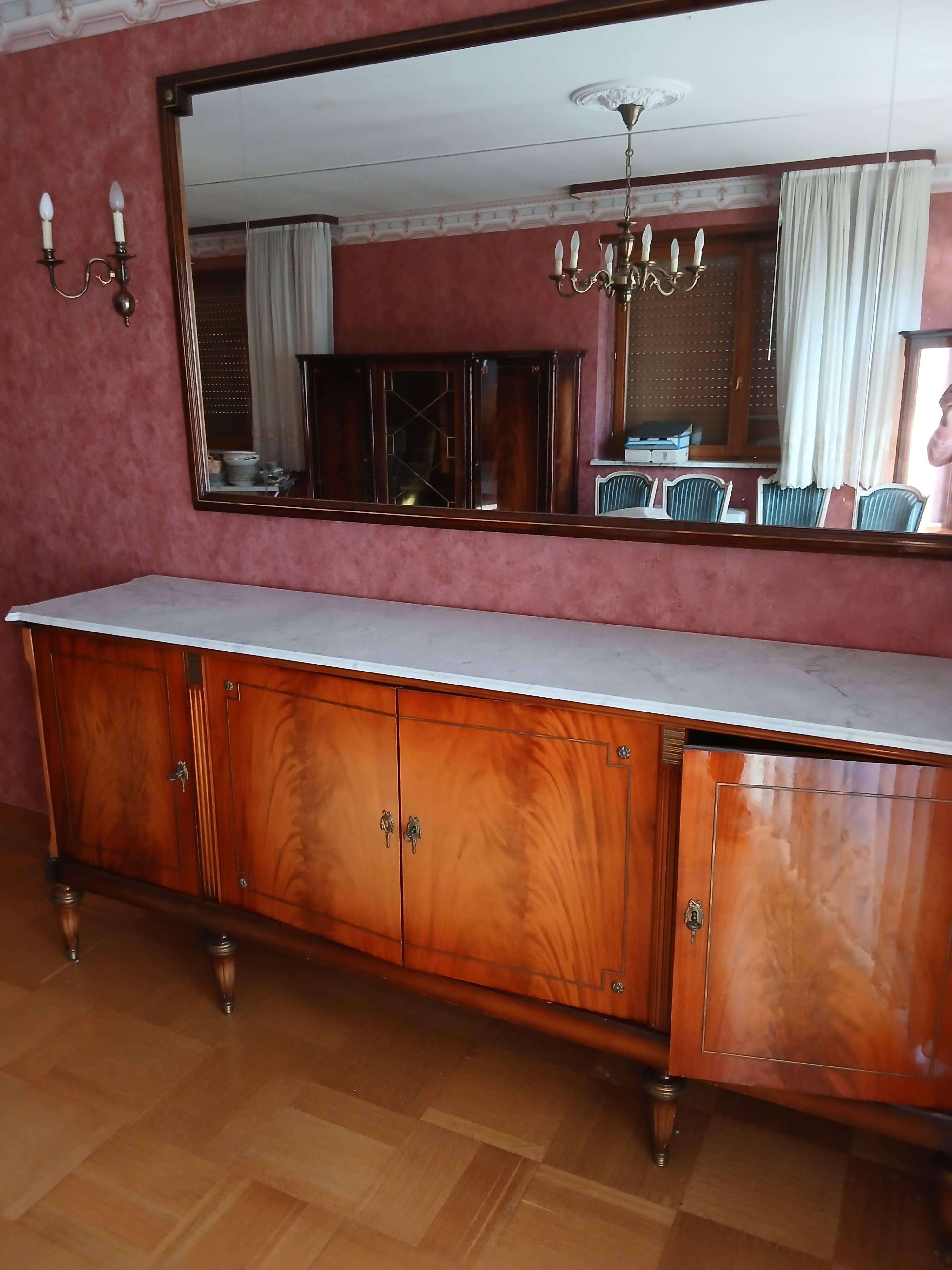 Mirror matching the 4-door mahogany sideboard