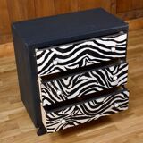 Restored chest of drawers with zebra tapestry 20th century
