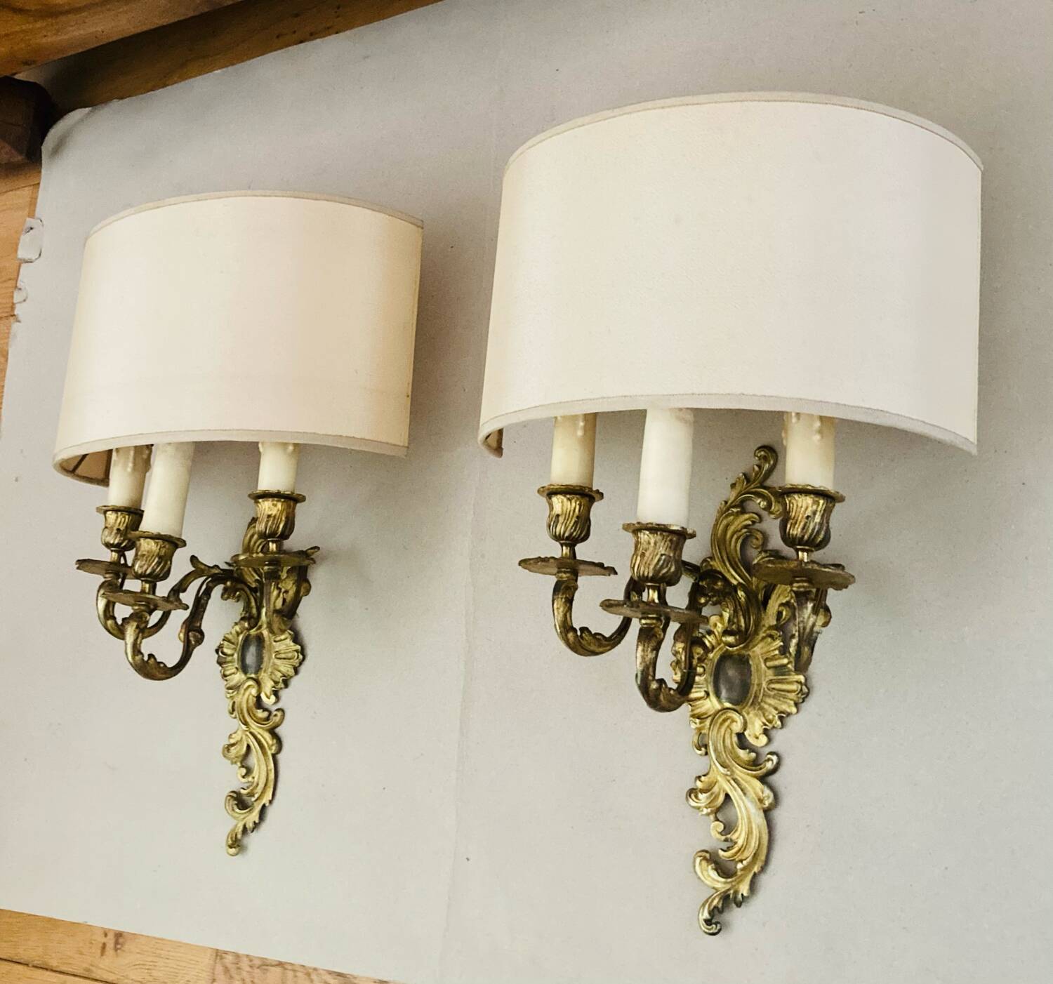 Louis XV gilt bronze wall lights from the 19th century with lampshades