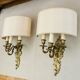 Louis XV gilt bronze wall lights from the 19th century with lampshades