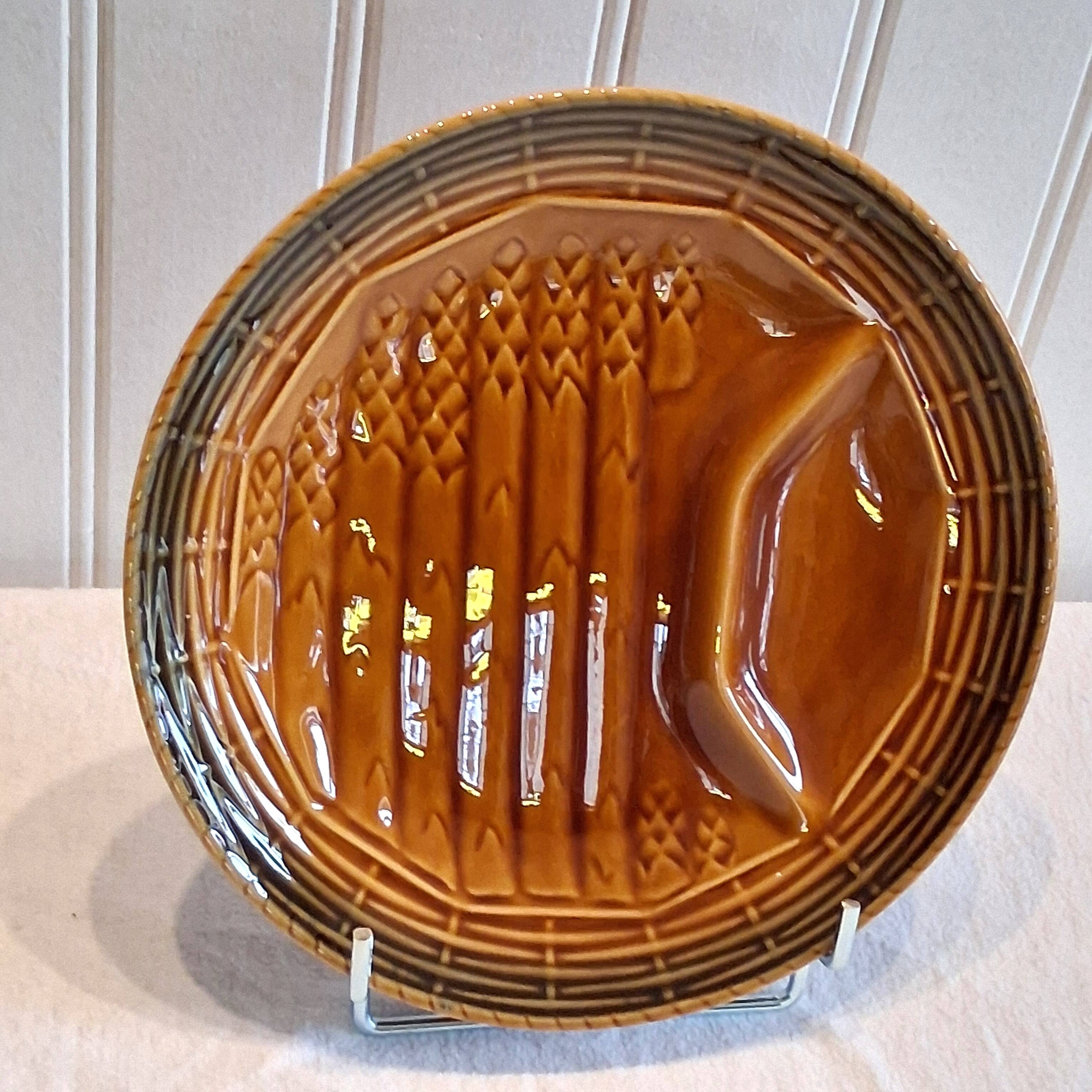 6 asparagus plates stamped "Sarreguemines" on the back in very good condition.