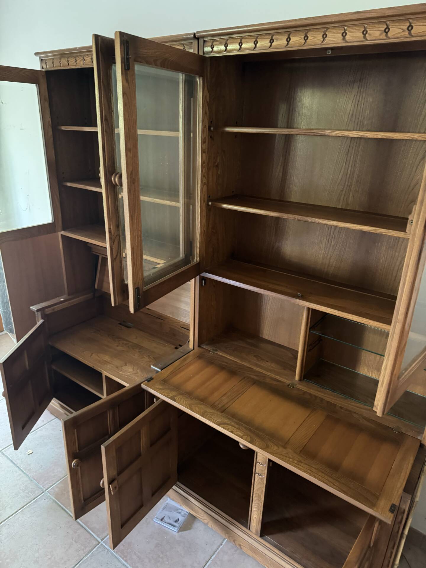Ercol library cabinets storage England in elm