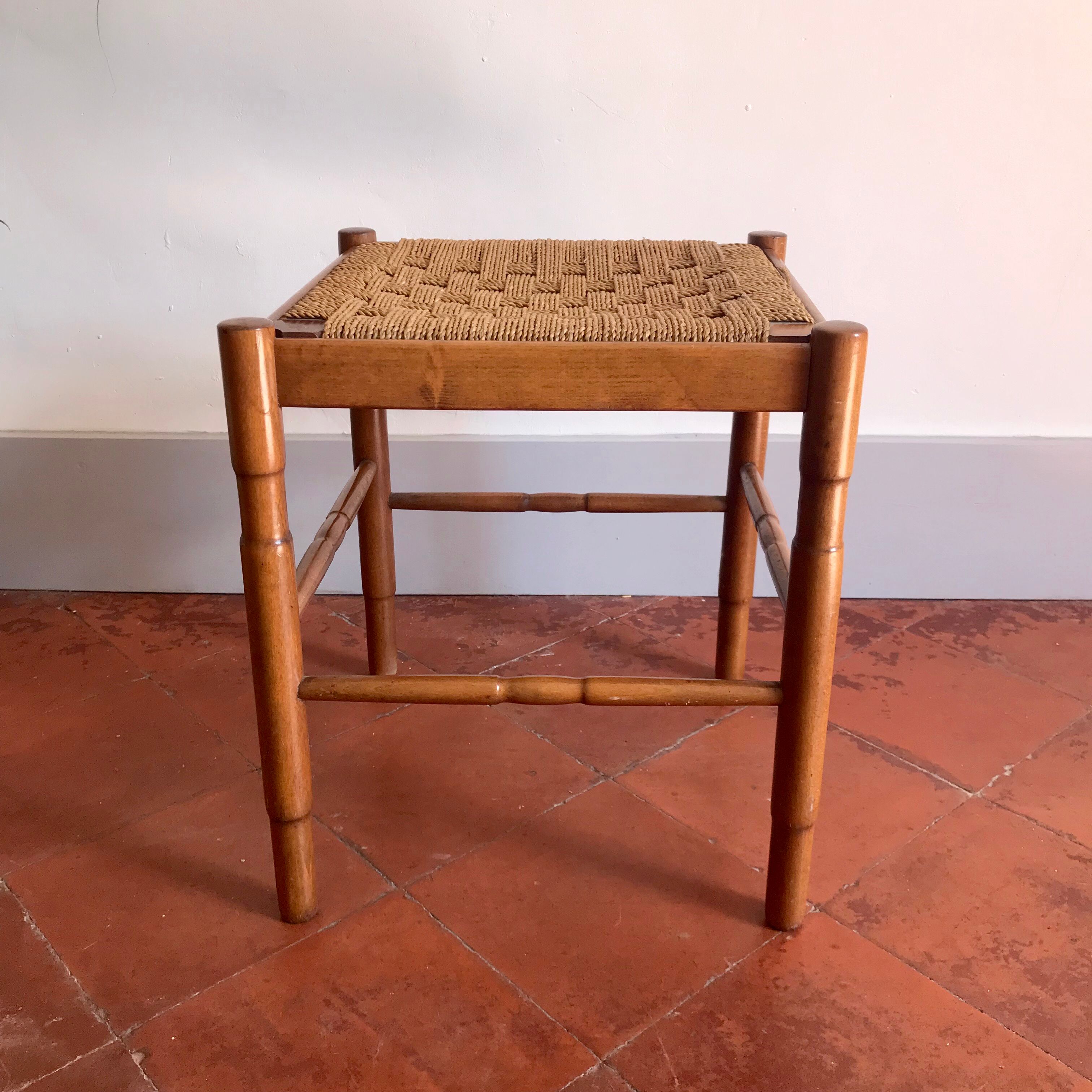 Wooden stool and rope
