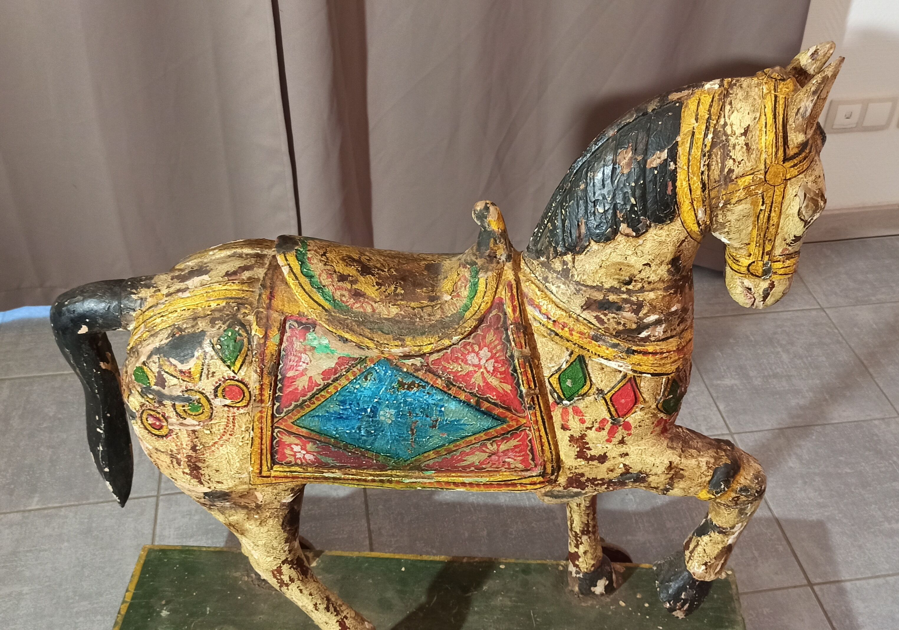 Old horse with wheels