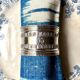 Monogrammed silver napkin ring with palmette and beaded motifs