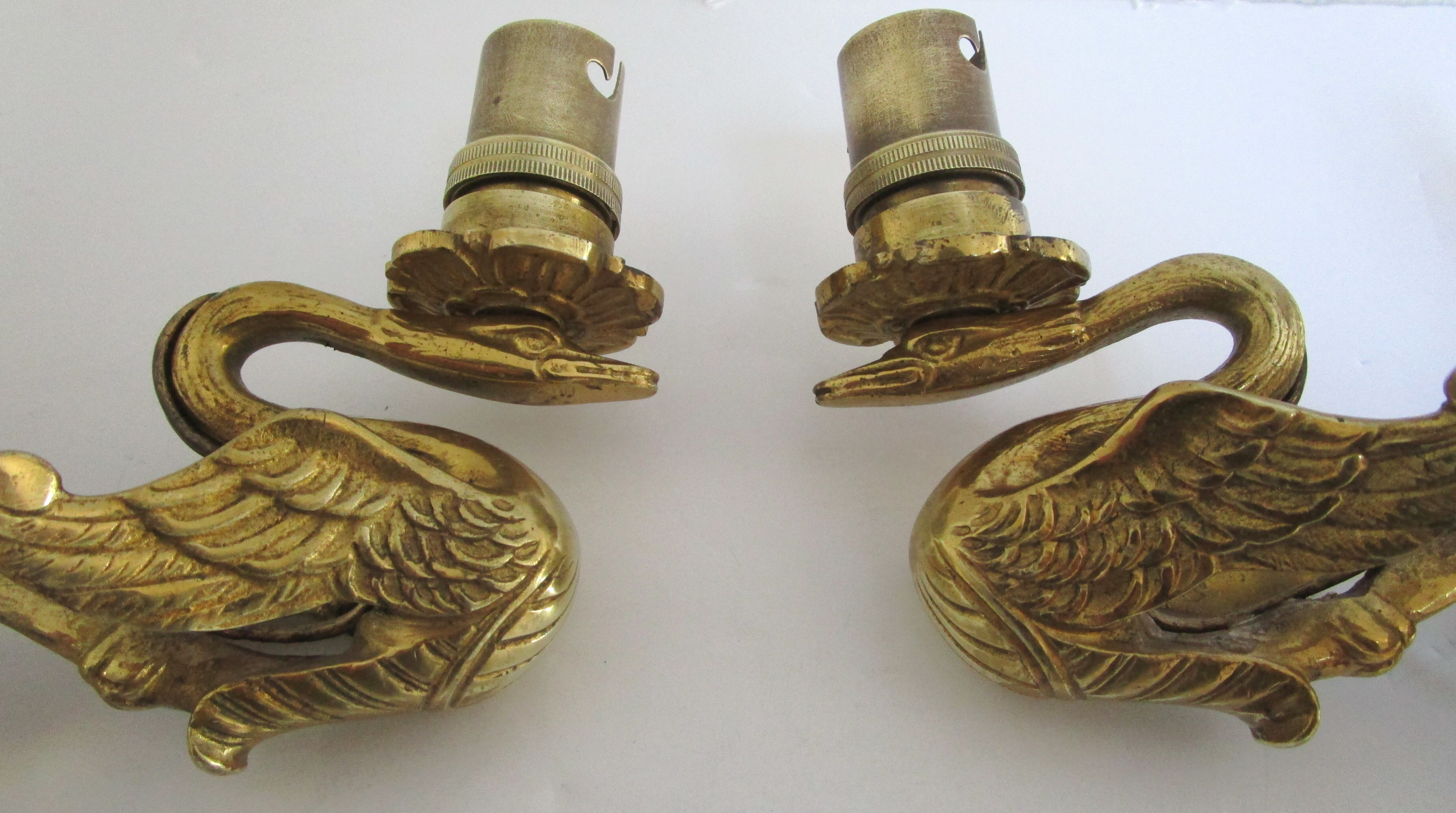 Pair of appliques swans gilded bronze patinated empire style
