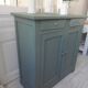 Vintage Parisian sideboard with 2 doors and 2 drawers, re-enchanted in smoky green.