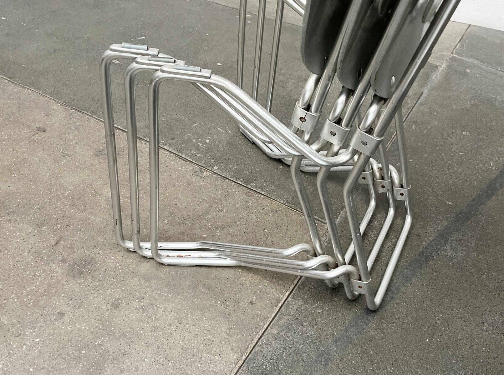 Stackable folding chair in space age style from the mid-century by Armin Wirth for Aluflex, 1960s, set of 3.