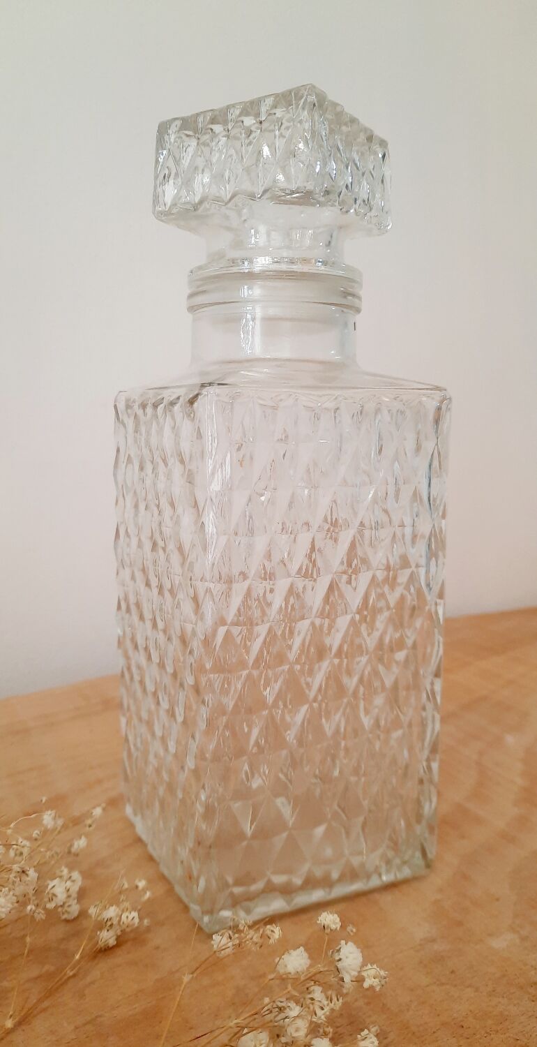 Carved glass decanter