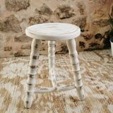 Tripod stool with patinated plant holder