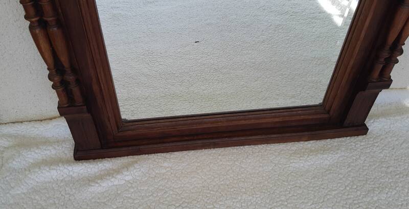 Henri II trumeau mirror for a fireplace in solid walnut.