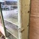 Petite vitrine en bois laqué vert
