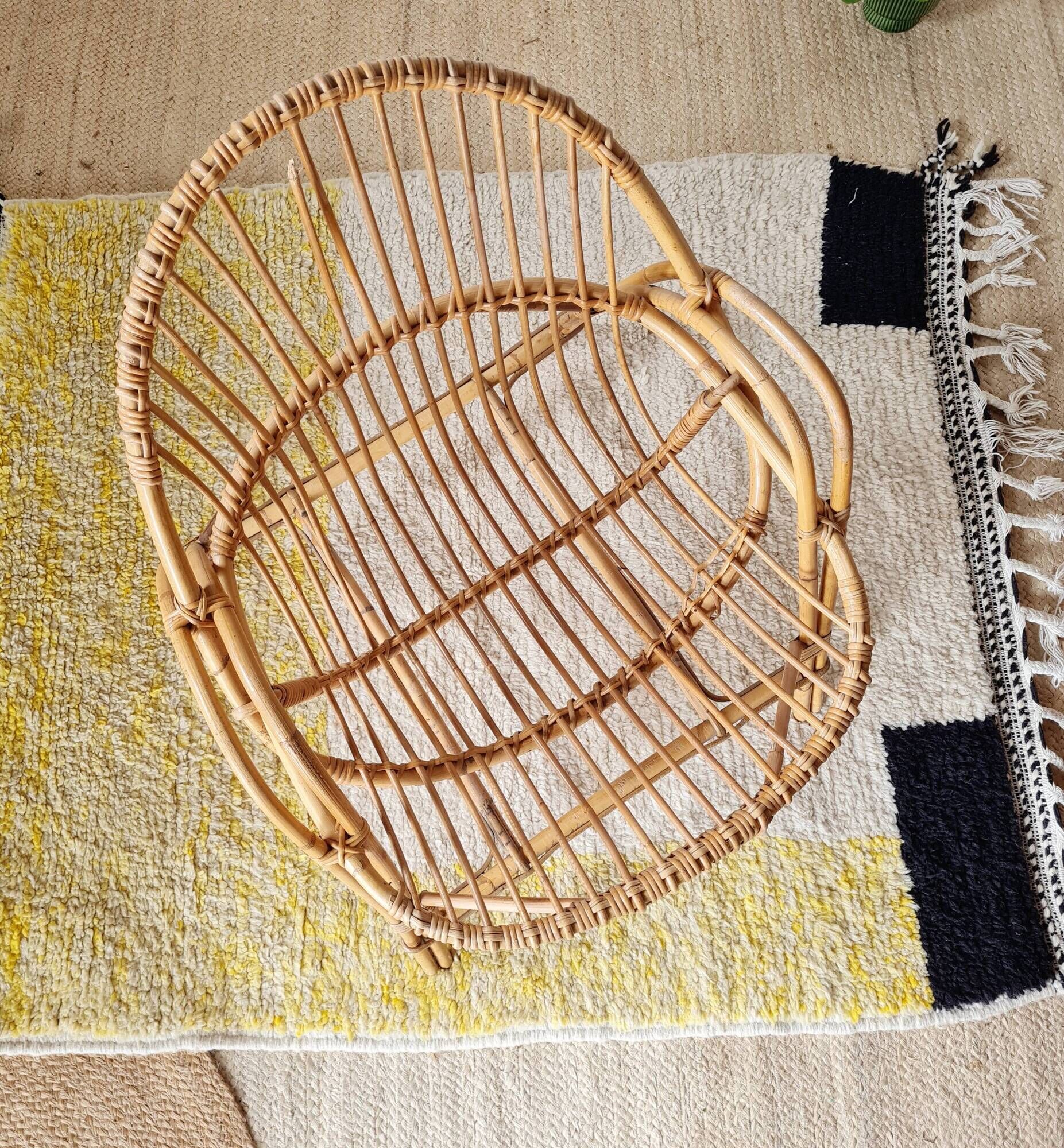 Vintage adult rattan armchair from the 1960s.