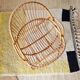 Vintage adult rattan armchair from the 1960s.