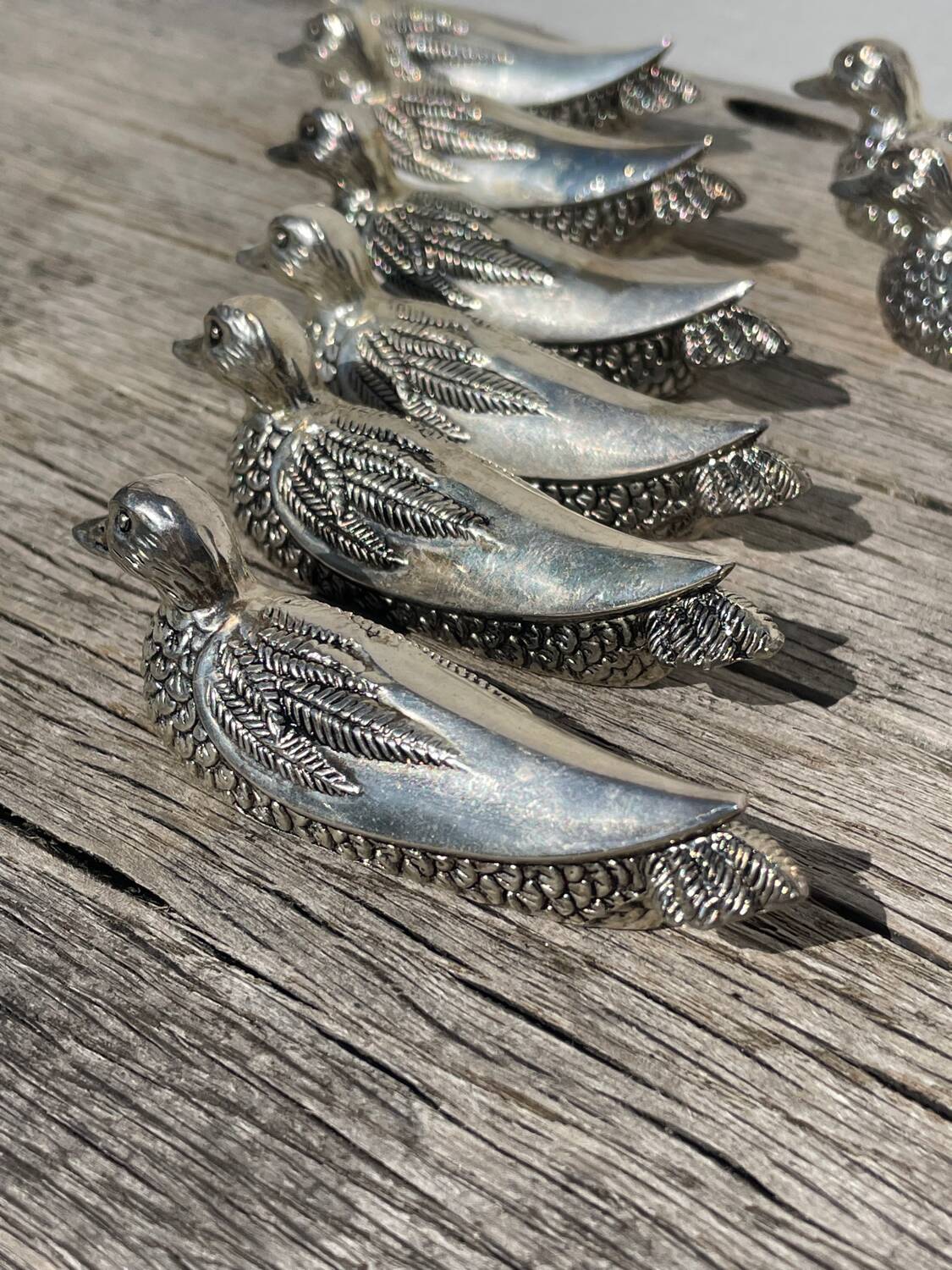 12 silver metal duck knife rests