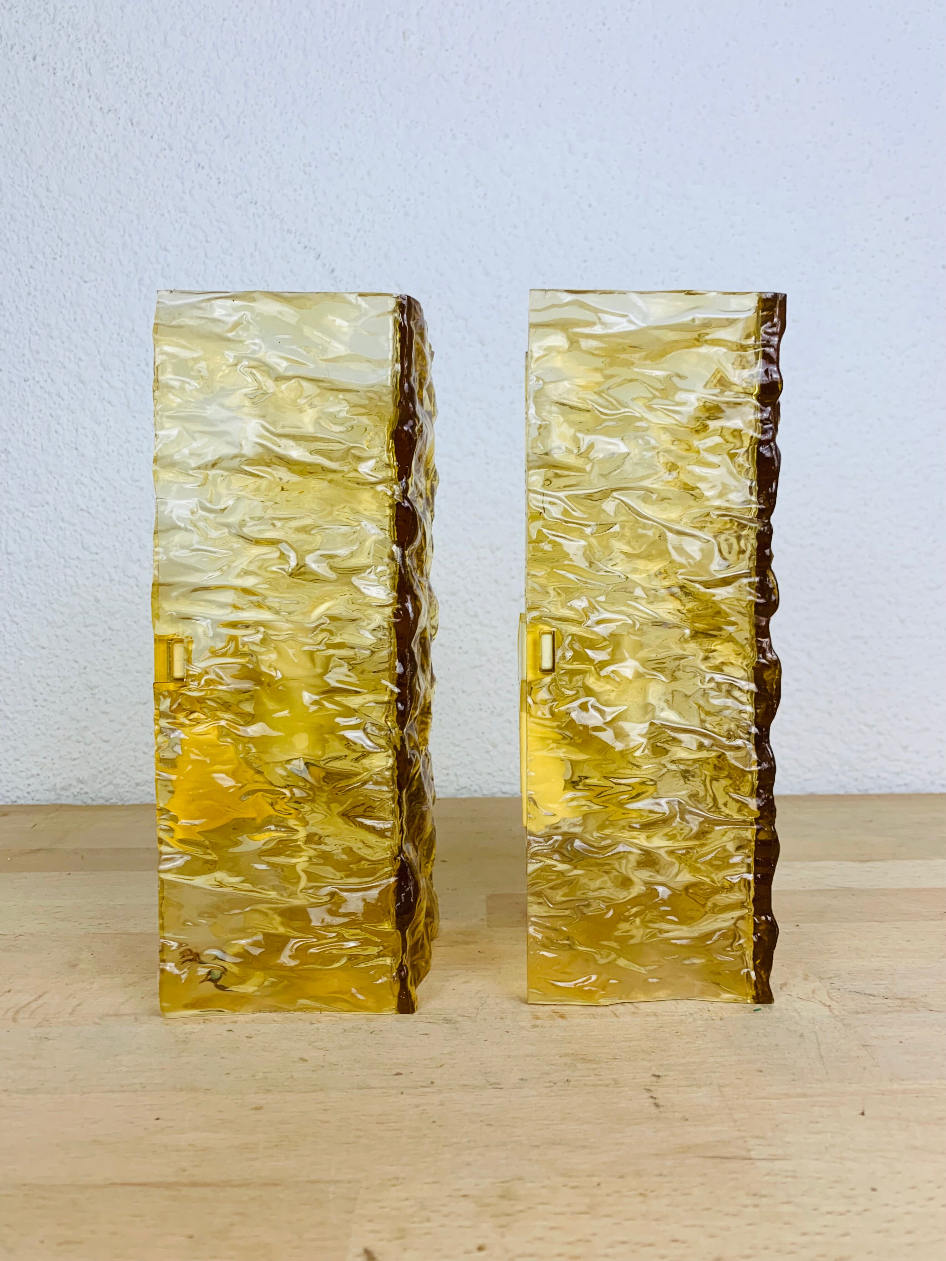 Pair of vintage amber resin wall lamps