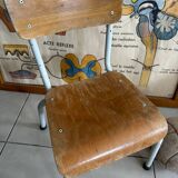 Old wooden and metal children's school chair