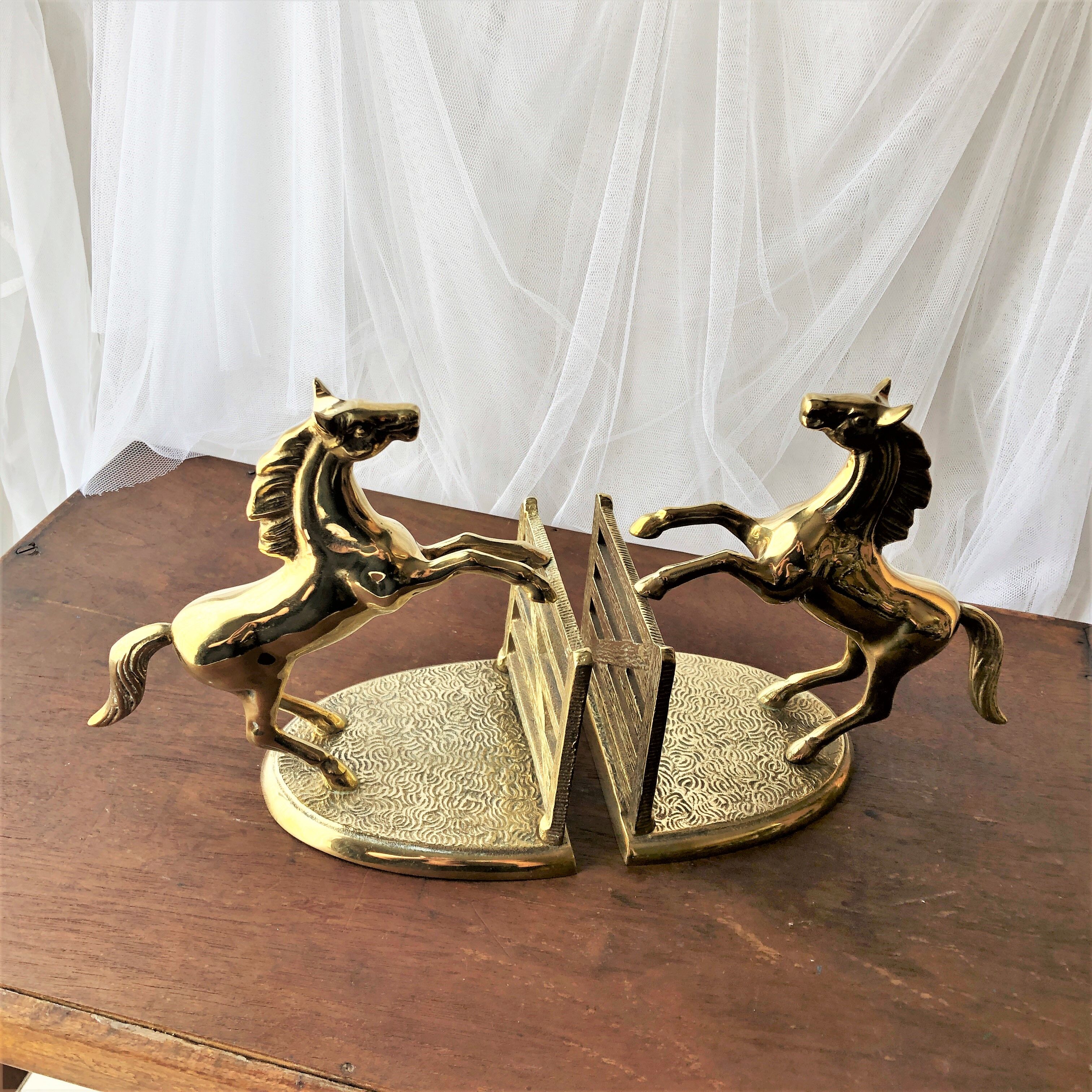 Goldeneye brass décor horses