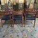 6 Scandinavian chairs in black Skaï