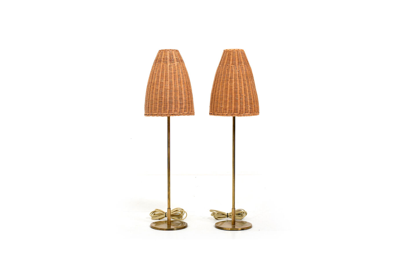 Pair of mid century table lamps with wicker shades by lyfa