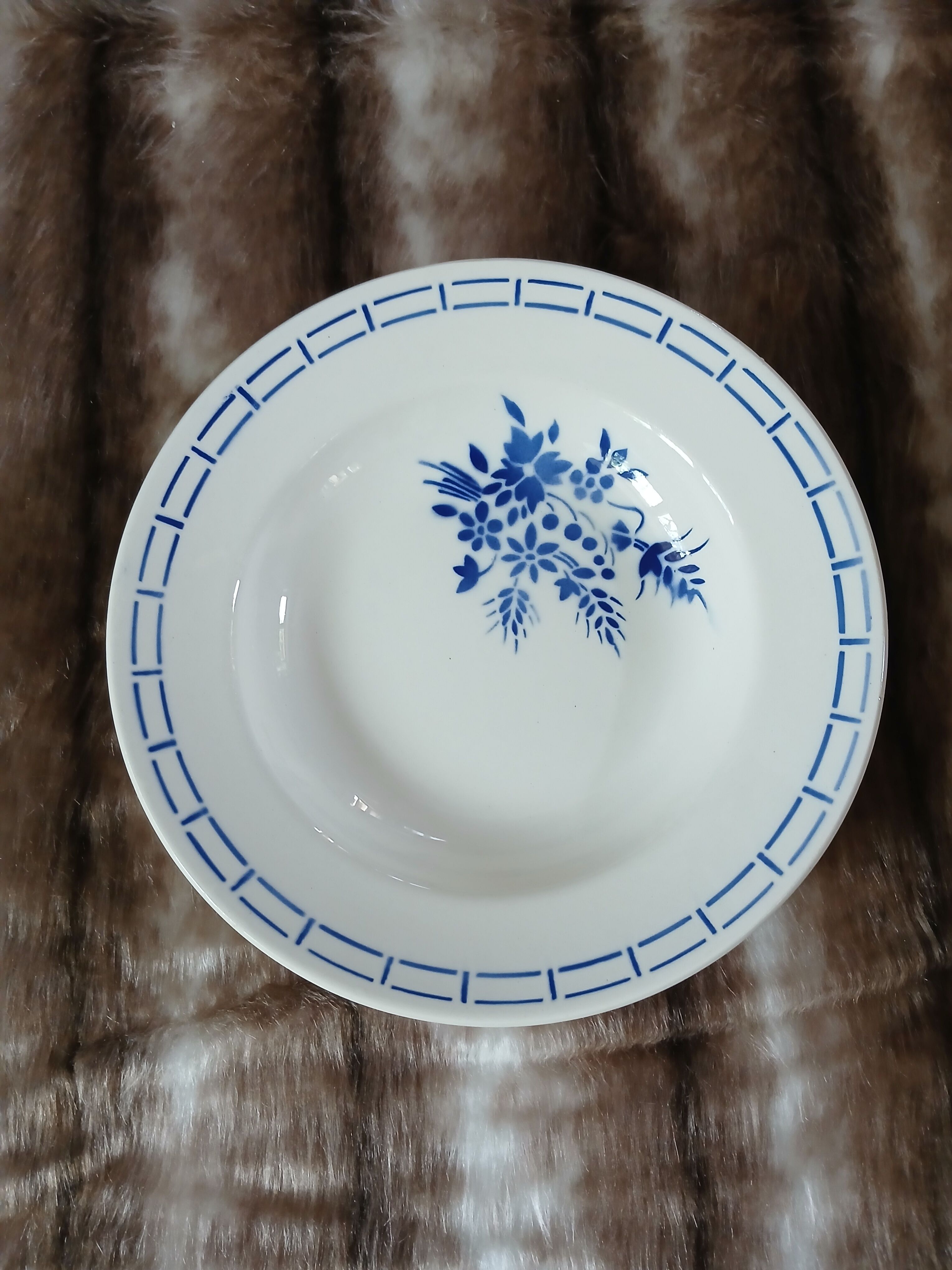 8 mismatched antique deep plates