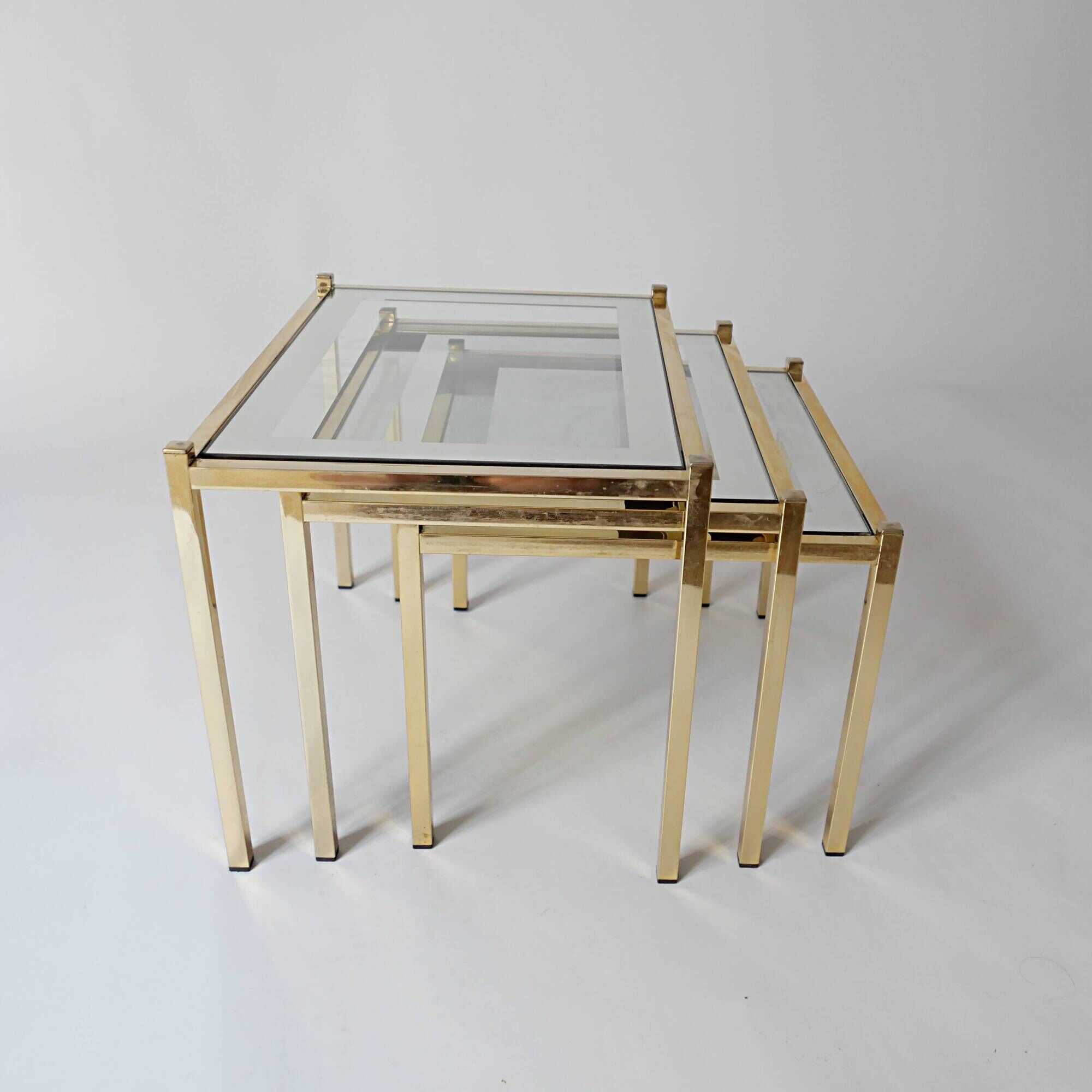 nesting tables in gold metal and mirror vintage 1970s design