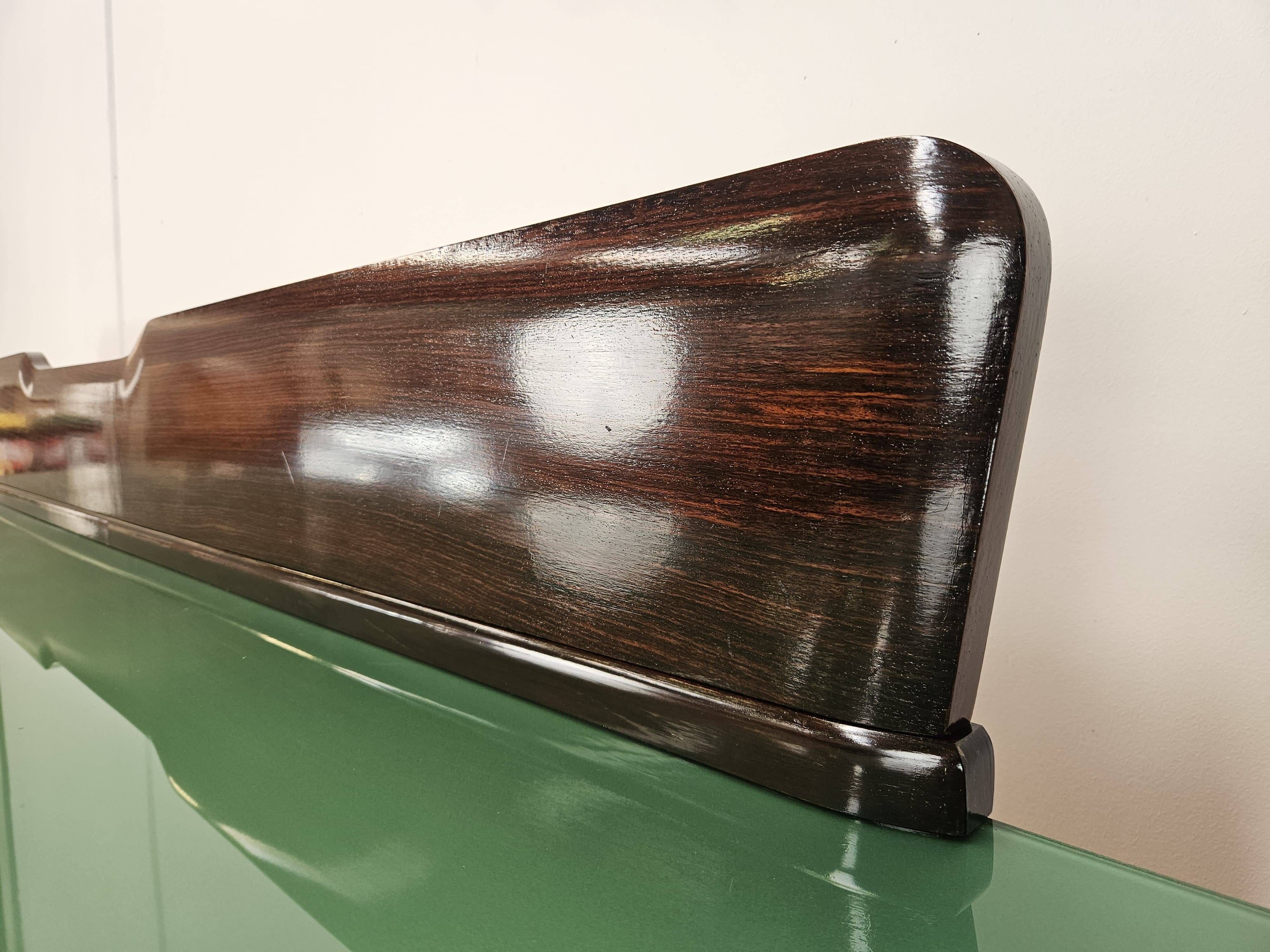Mahogany sideboard with a glass top, 1960