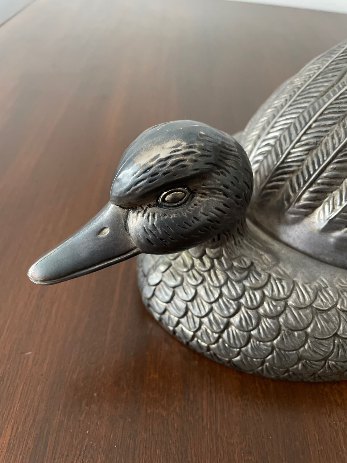 Serving dish with bell in silver metal shape duck