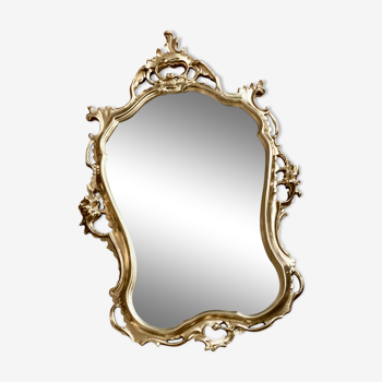 Baroque gilded mirror in stuck