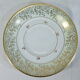 Green and gilded LIMOGES porcelain cup and cup lunch
