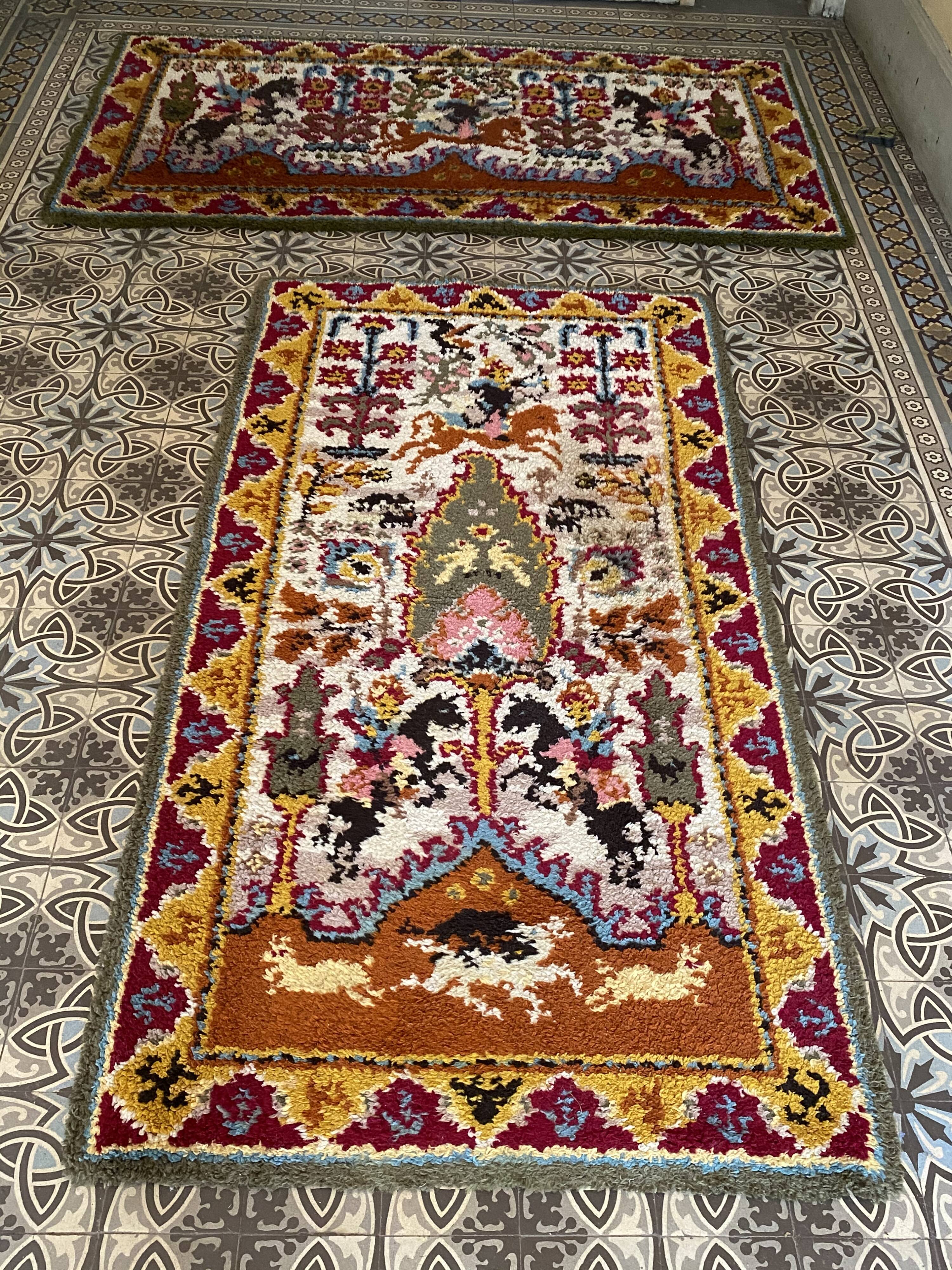 Duo of old oriental wool rugs