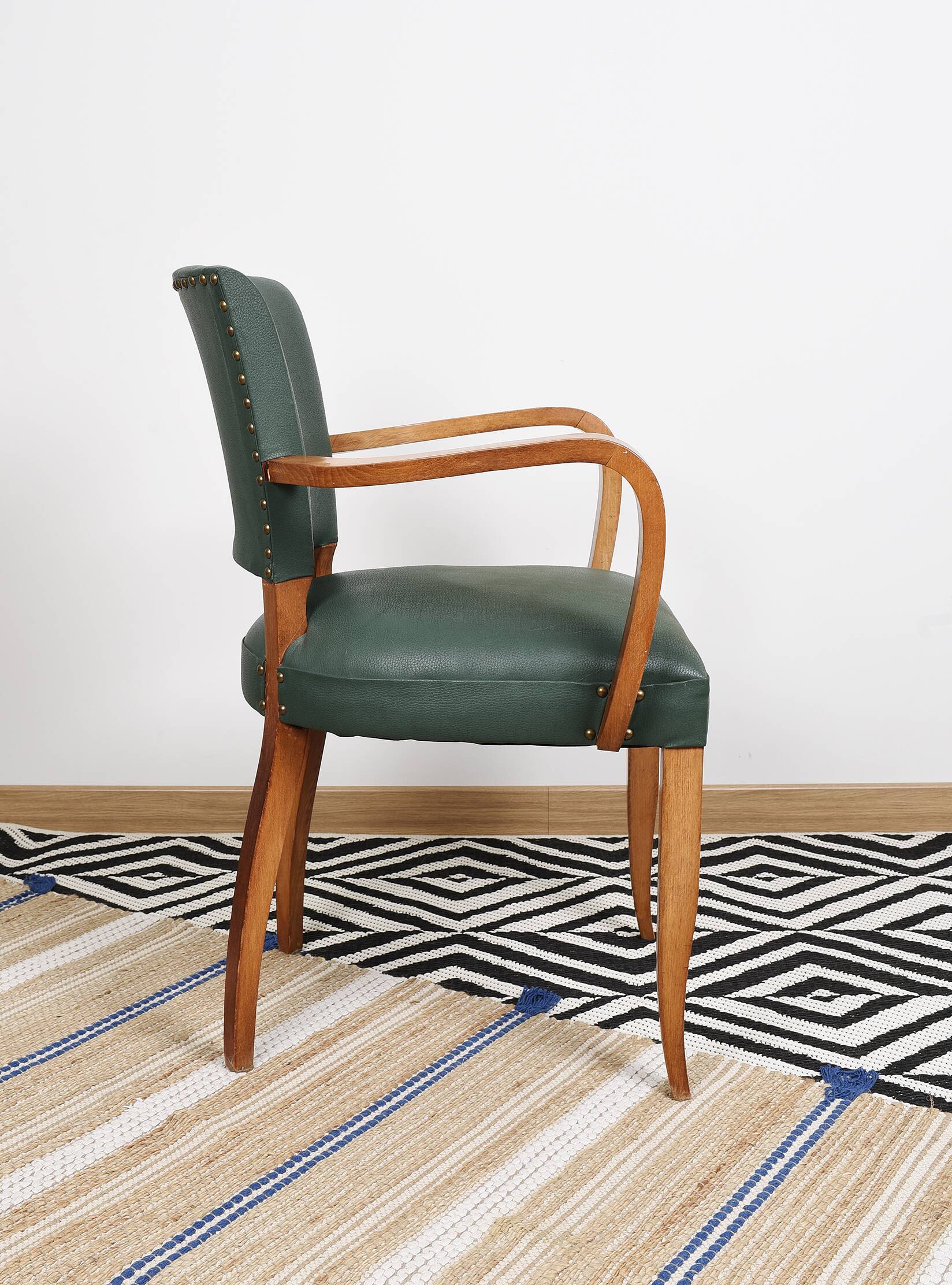 Bridge armchair in green moleskin