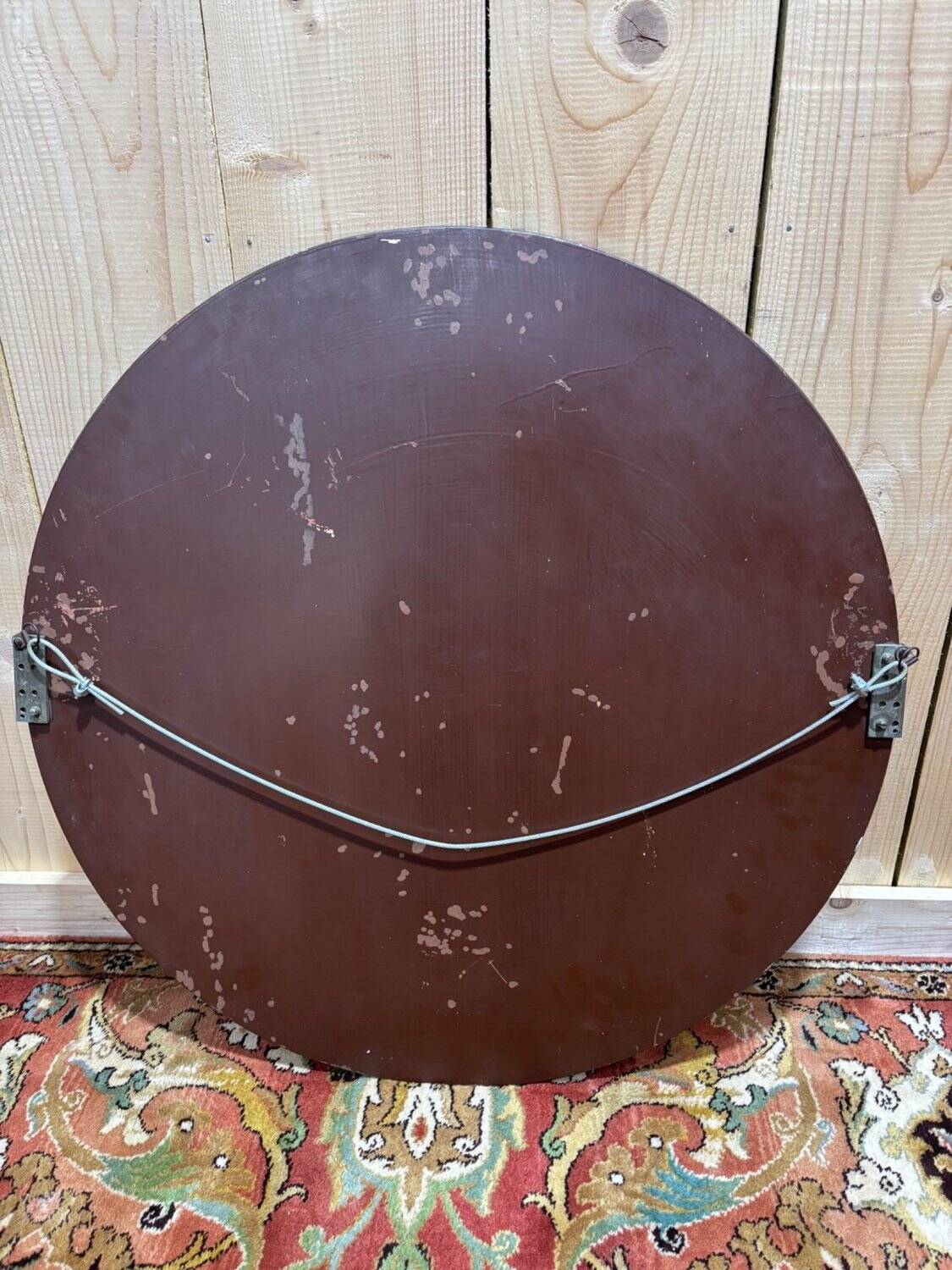 Round Art Deco mirror from the 1940s/50s with a bevelled edge.
