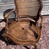 Pair of caned convertible armchairs Louis XV period