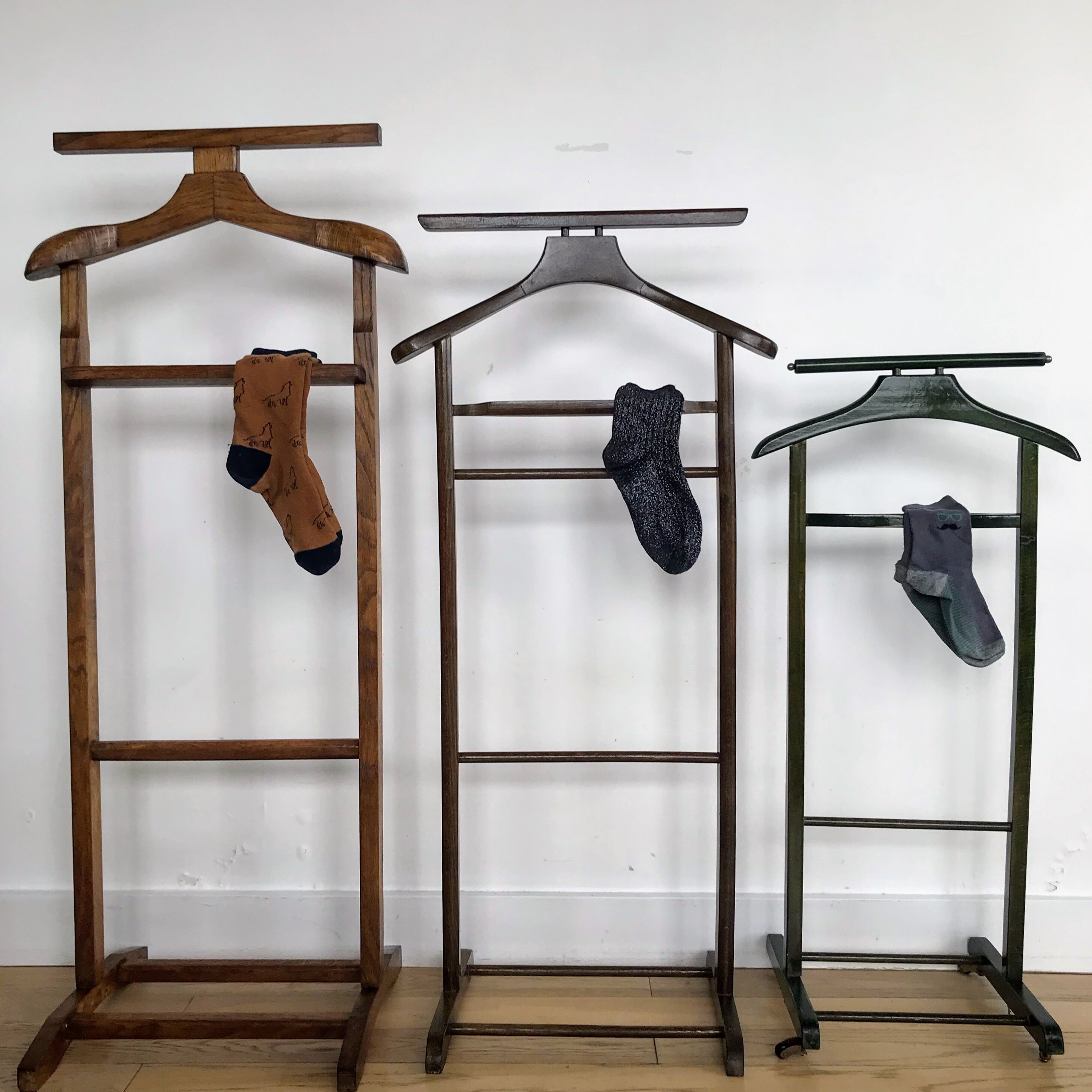 Vintage children's room valet in green varnished wood on roulette