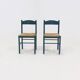 Lot de 2 chaises de salle à manger en bois teinté et jonc années 1960