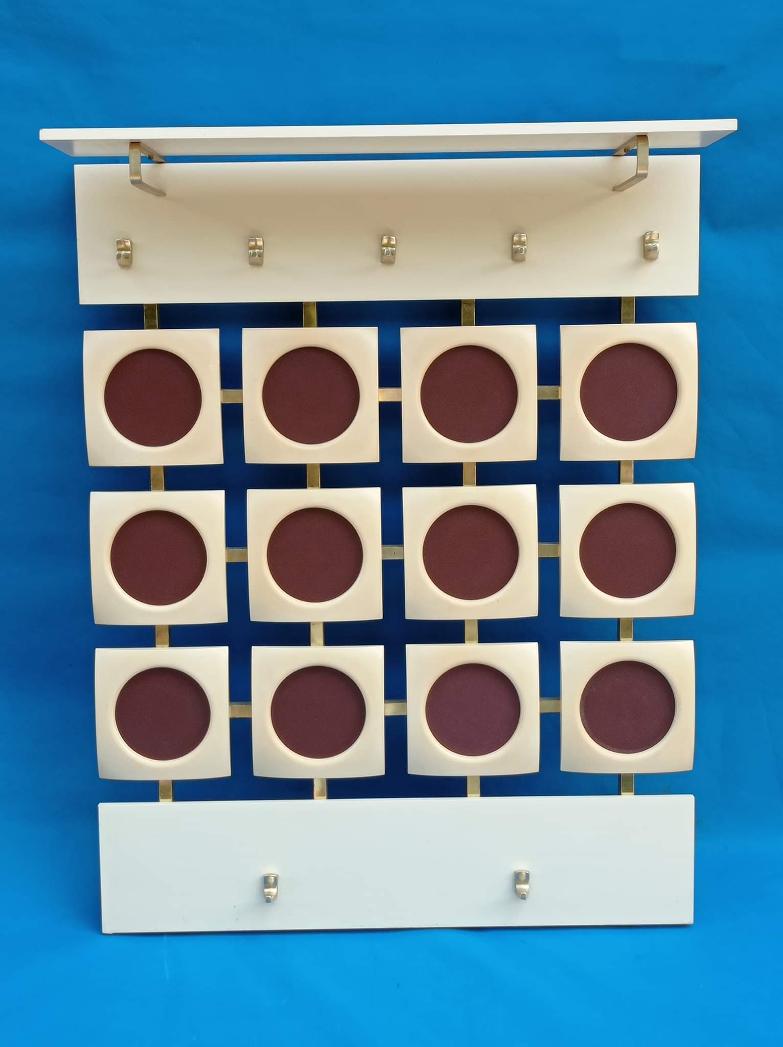 White wall coat rack from the 60s-70s