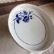 Cup on foot in white ceramic and blue flowers / vintage 50-60 years