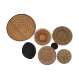 Wall composition of seven baskets and wicker trays