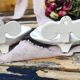Two vintage soap doors in enamelled cast iron