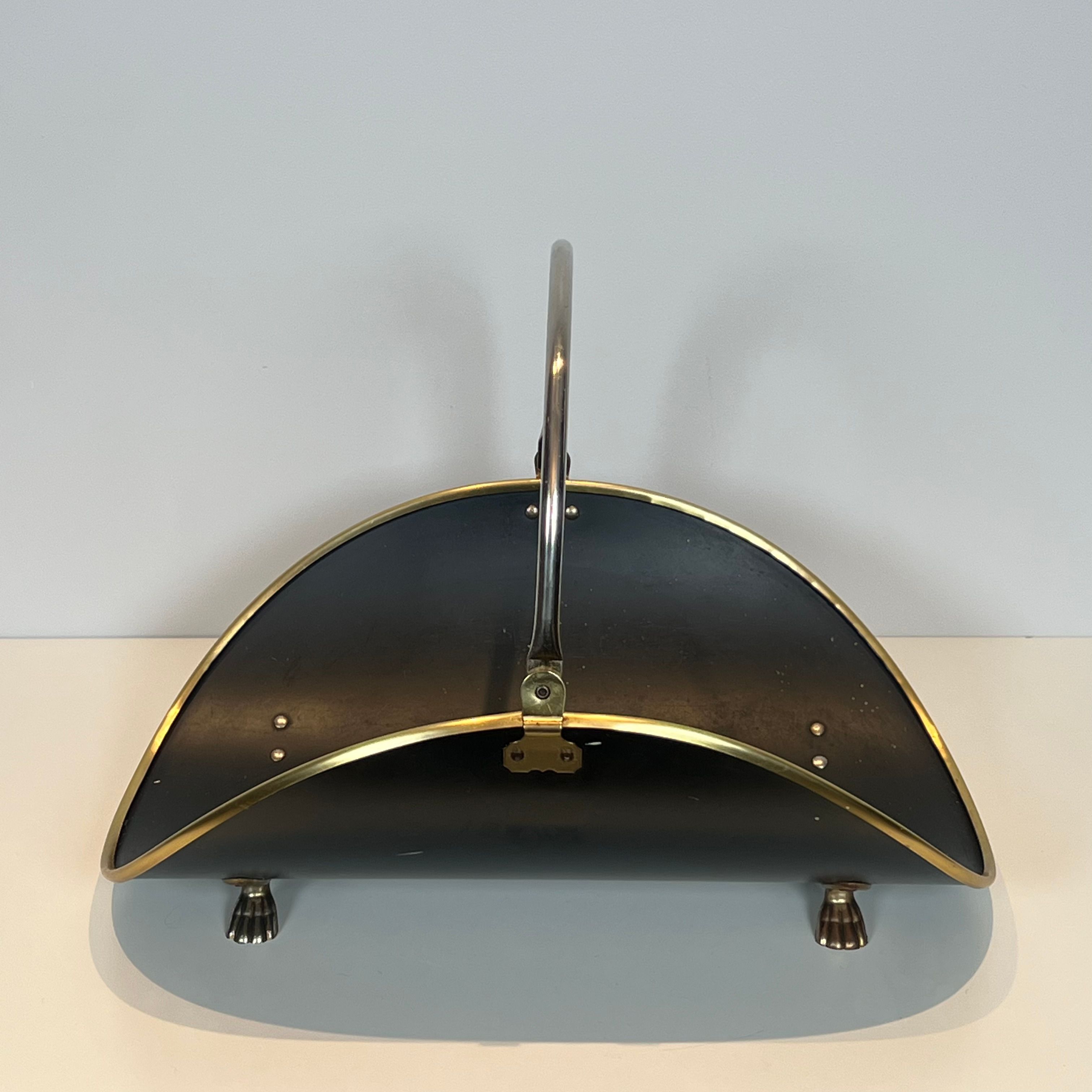 Neoclassical log holder in brass and black lacquered brass