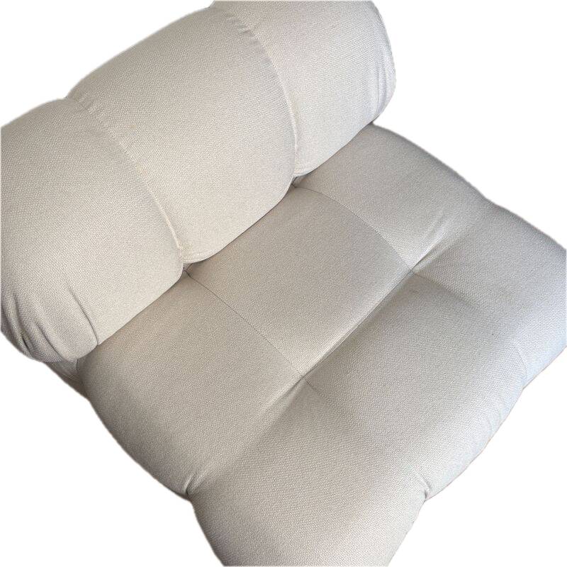 Armchair inspired by the Cameleonda model, designed by Mario Bellini.