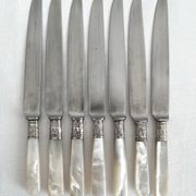 Antique table knives in mother-of-pearl and silver-plated metal
