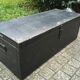 Old chest or wooden trunk black patina