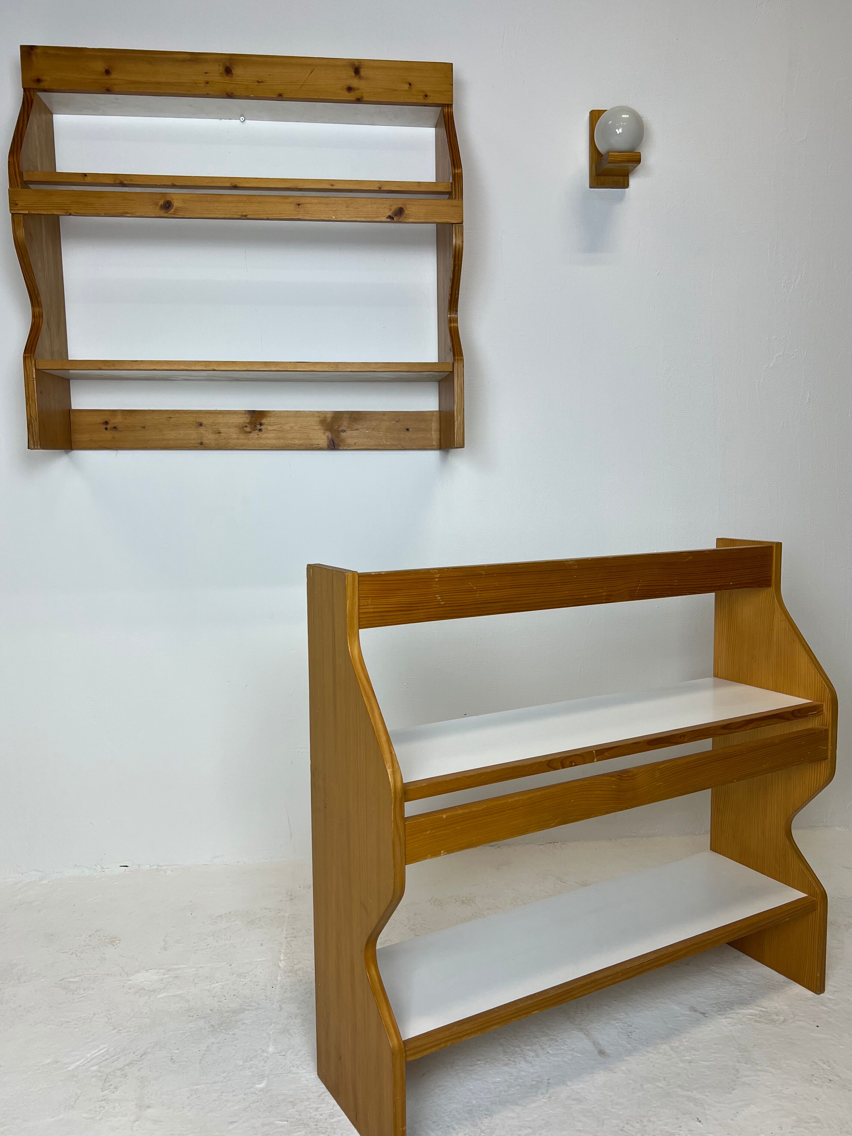 Duo of shelves by Charlotte Perriand