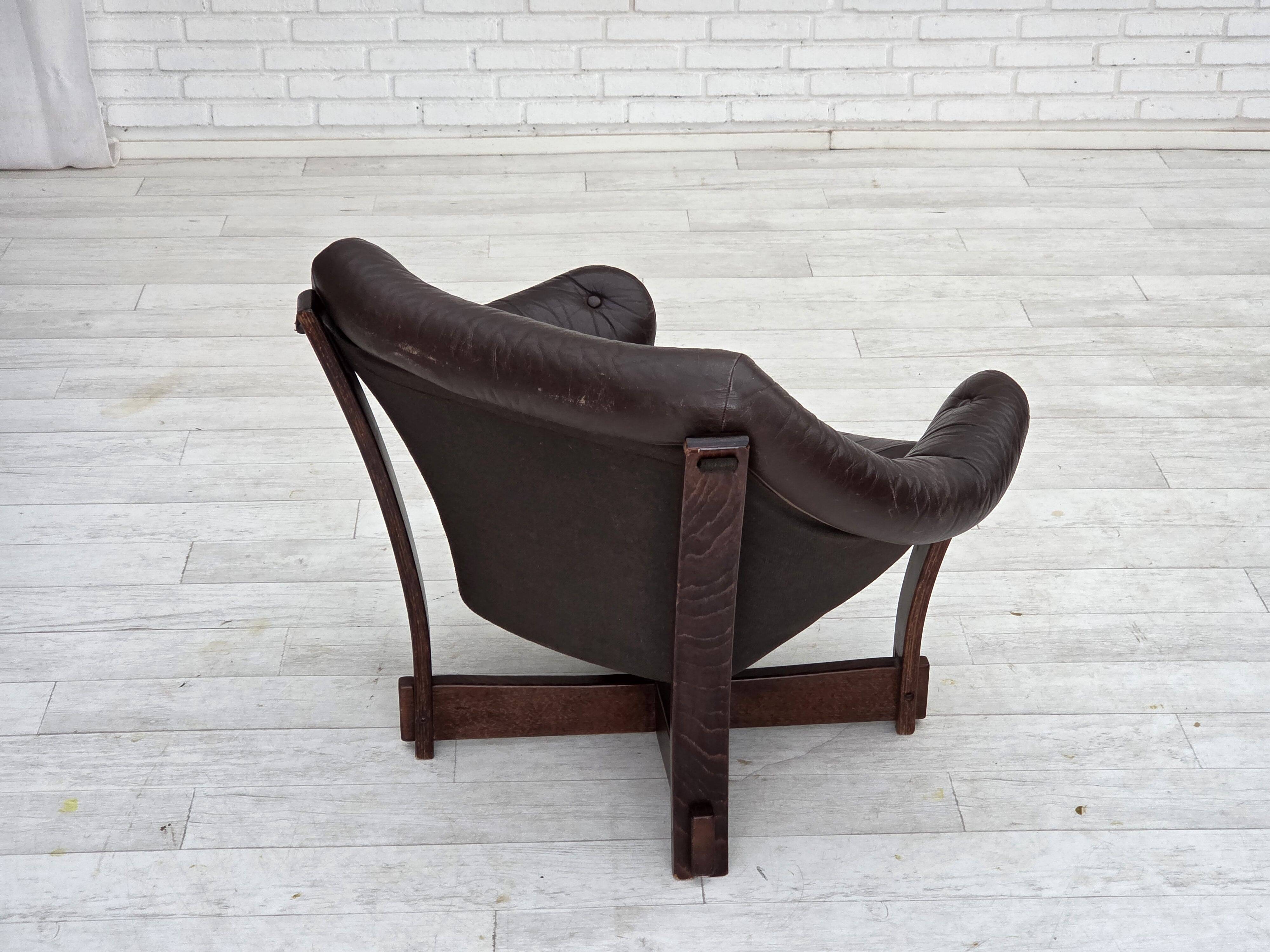 1970s, Scandinavian lounge chair, furniture leather, oak wood.