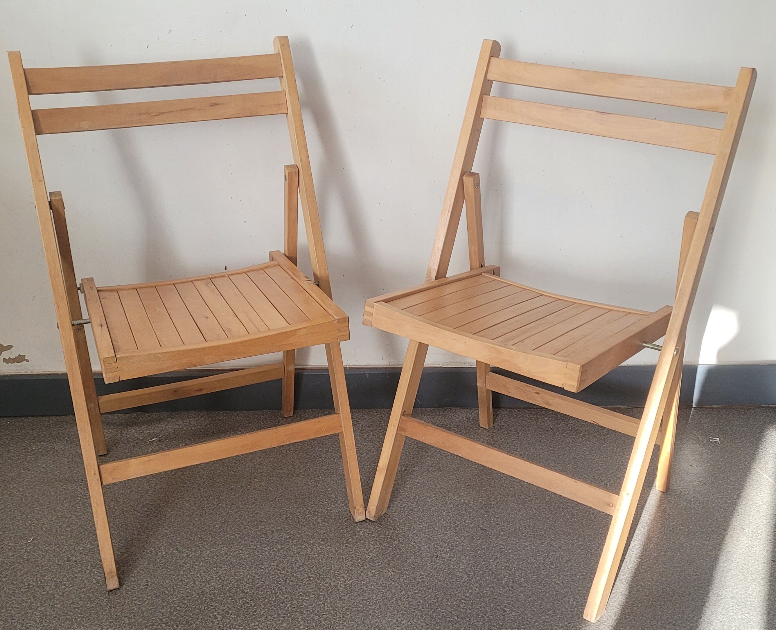 Pair of vintage wooden folding chairs