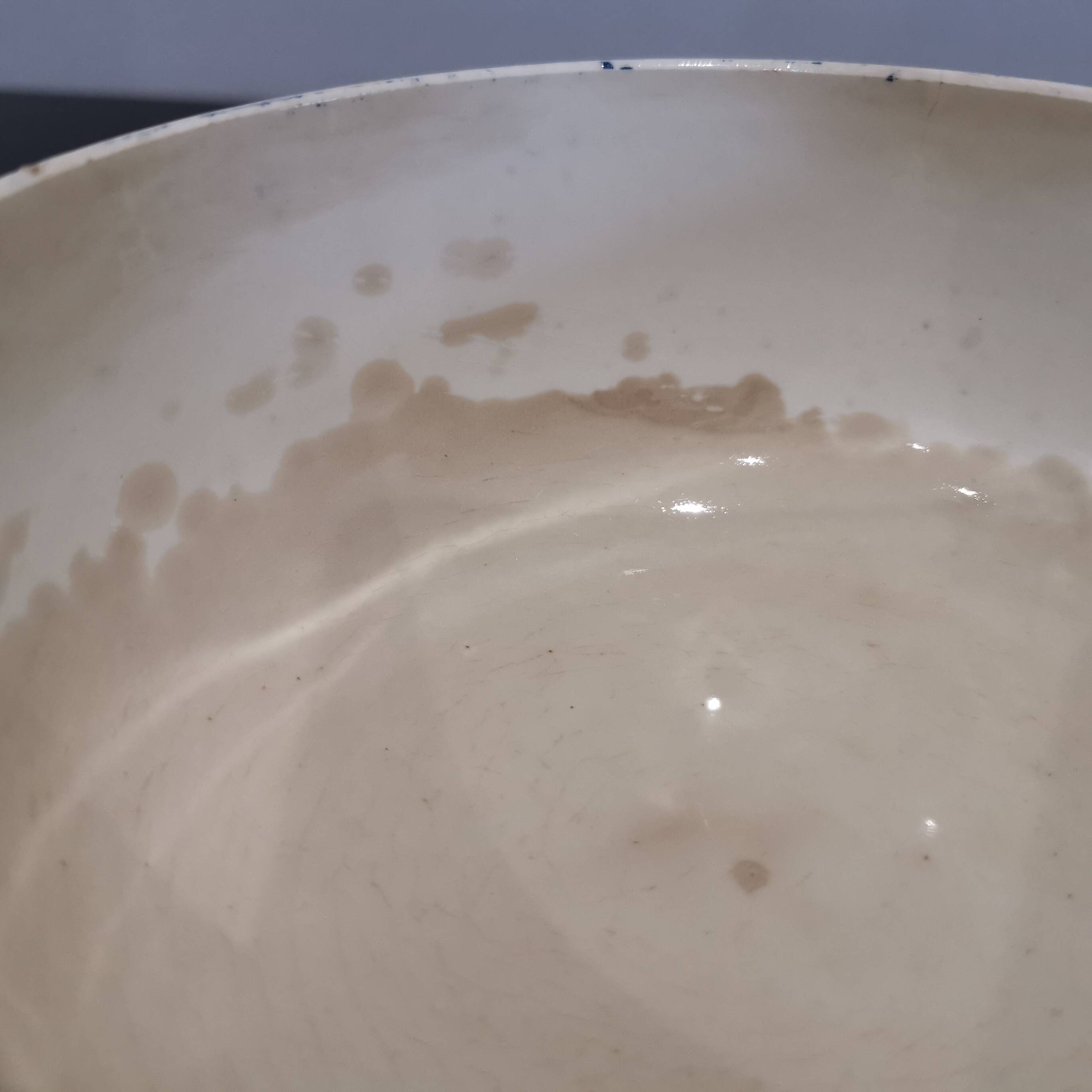 Butterfly ear bowl in iron clay with blue patterns